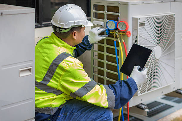 Professional Air Duct Cleaning technician working in Marshall, AR